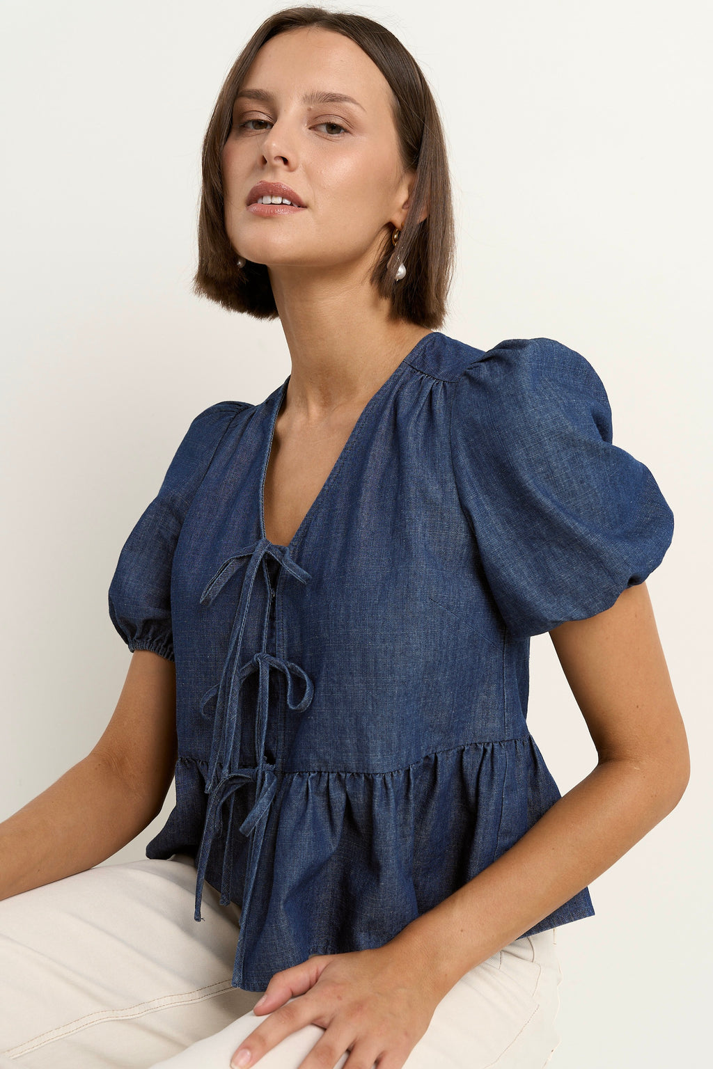 Restore Storm Blue Chambray Tie Front Peplum SS Top