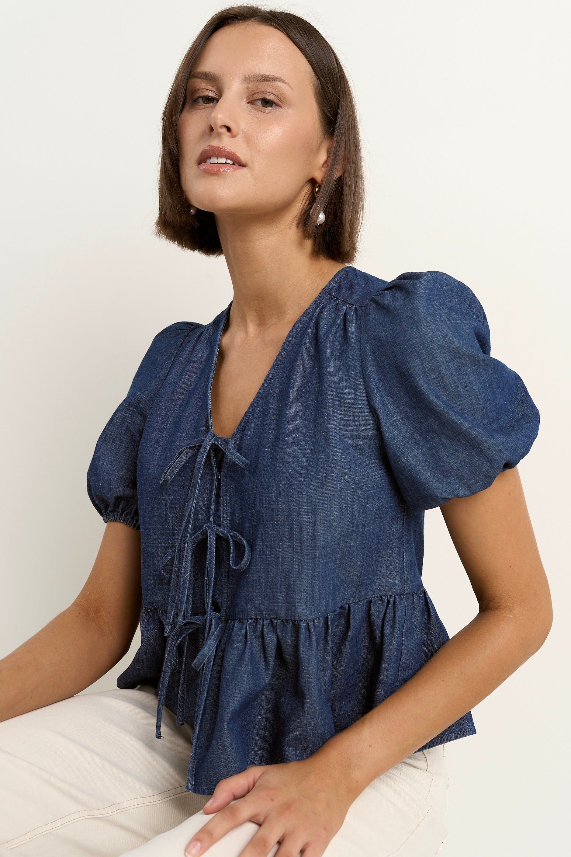 Restore Storm Blue Chambray Tie Front Peplum SS Top