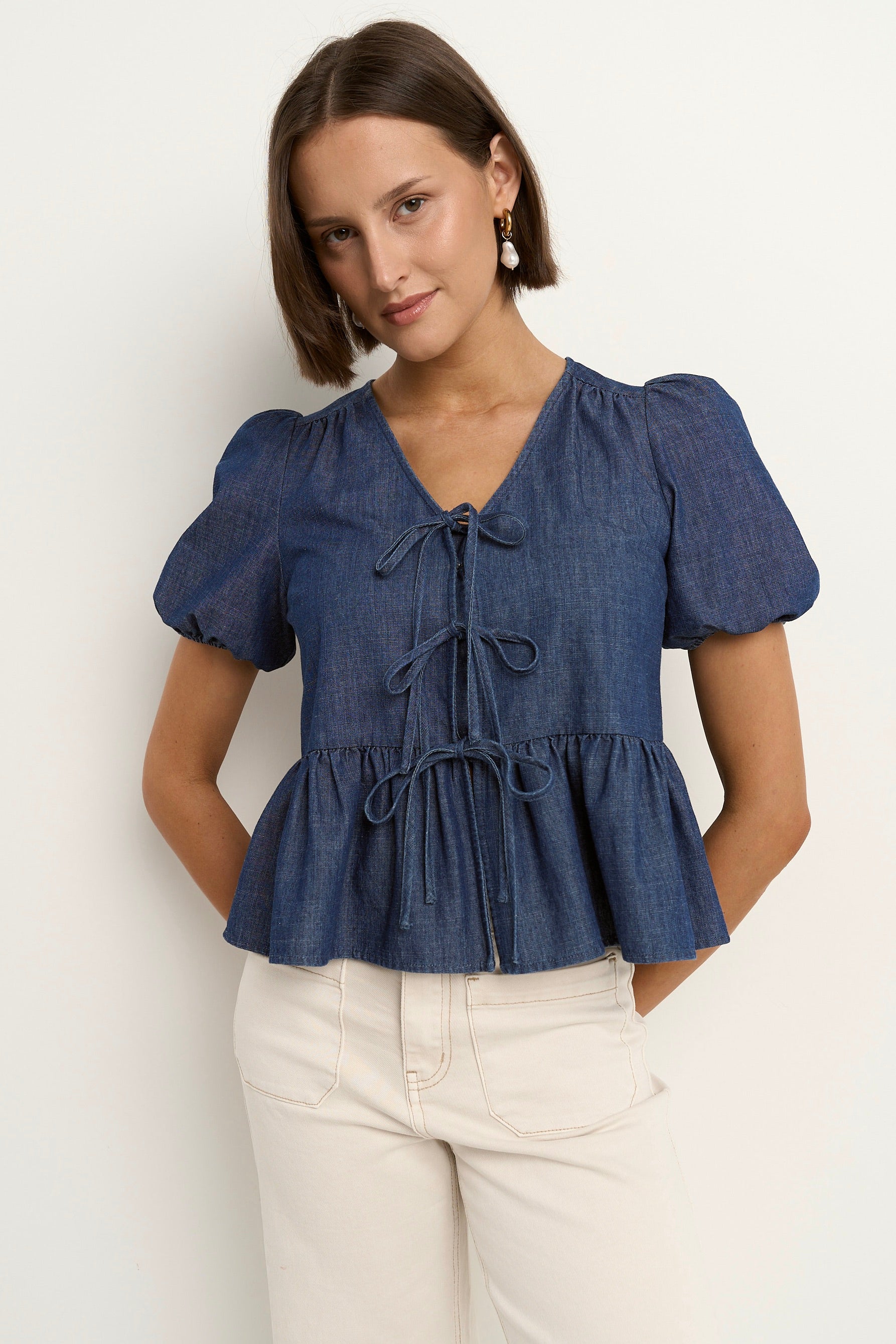 Restore Storm Blue Chambray Tie Front Peplum SS Top